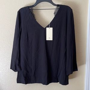 TK- size L. 3/4 sleeve with lace back detail